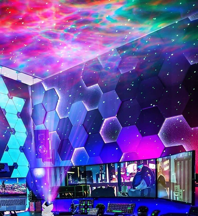 Astronaut projector on a desk casting a colorful nebula and stars across a room ceiling